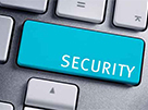 Türkise Taste einer Computertastatur mit weissem Auftruck "Security"